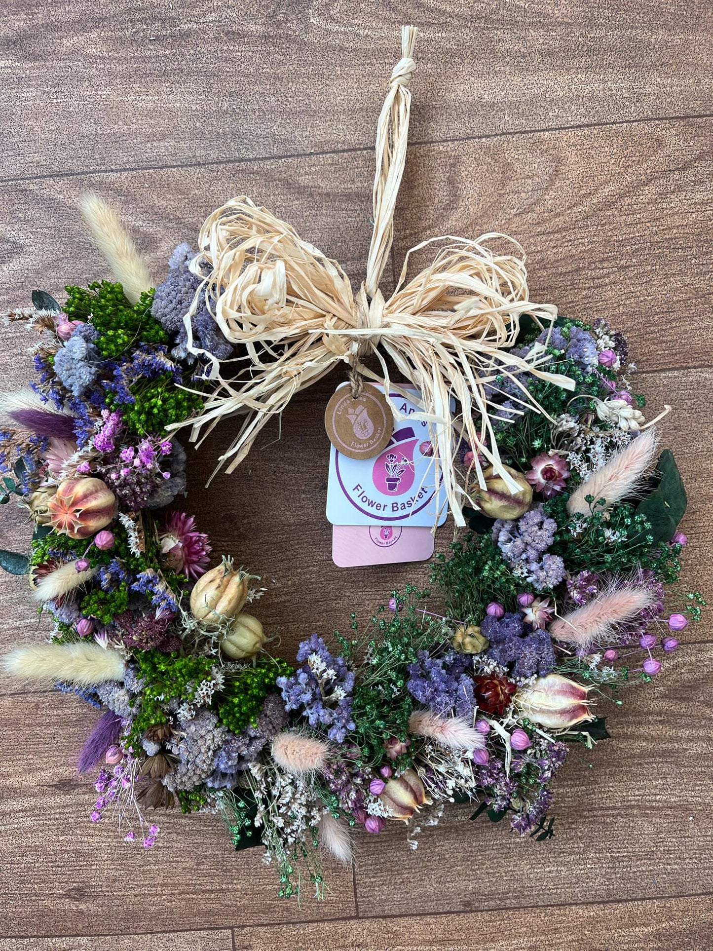 Purple and green dried flower wreath